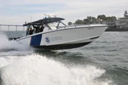 SAN DIEGO, CA, USA: Border patrol agents conduct a "fast boat drill" on the water near the San Diego-Tijuana border. In 2009, with heightened land enforcement fueling human smuggling by sea, the border patrol introduced this fast, 43-foot boat for pursuit of high-speed vehicles.