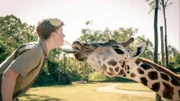 Robert with a giraffe.