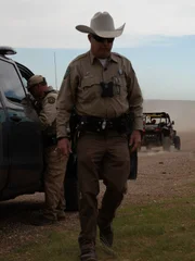 Game Wardens Matt Marshall and Shane Lewis surveying ATV trails.