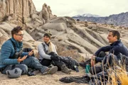 Bobby Bones, Caitlin Parker and Bear Grylls take a break along their journey through Buttermilk Country. (National Geographic/Ben Simms)