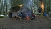 The Brown family gathered around the fire.