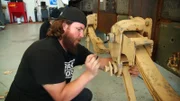 The mechanic working on the ten-ton vehicle.