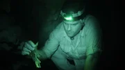 Josh discovers a chunk of scaly skin in a cave in Barceloneta, Puerto Rico.