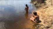 Nathan and Whitney fishing.