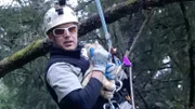 Using a stuffed cat, Shaun Sears demonstrates the proper way to hold a cat during a rescue.