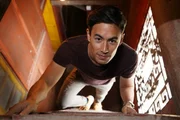LIZHOU TOWN, XICHANG, SICHUAN, CHINA - George reaching the top of the Xinxhan Temple by stairs, the lighthouse used to pointing out the direction for passers-by when night falls for hundreds of years.
