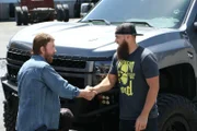 L-R: Chuck Norris shakes Dave Sparks hand.