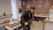 Derek Muller playing electric skateboard