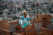 Tuany Nascimento, founder of "Na Ponta dos Pés" Ballet project, is seen posing on top of clay bricks, overlooking the view from Complexo do Alemão, Rio de Janeiro, Brazil. (MANDATORY photo credit: Sebastian Gil Miranda)