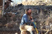 Mars Hill, NC, USA: Tony shovels outside his house. (Photo Credit: National Geographic Television/Lindsay Cooper)