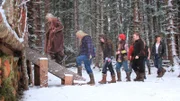 Brown family about to enter their home.