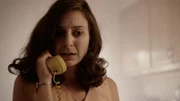 Concerned woman on phone