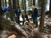 L-R: Gabe Brown, Matt Brown and Billy Brown tending to fresh kill.