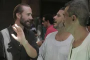Joe speaking with traders at the Aswan market.