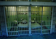 prison cells with beds