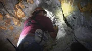 Dave Turin inspects an abandoned mine in the Big Belt Mountains.