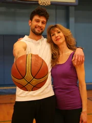 Mike and Liz bond while playing basketball.
