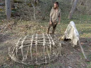 Mars Hill, NC: Thorn working on the frame of his coracle.