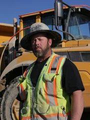 Casey Morgan standing in front of Rock Truck