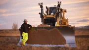 Casey Morgan leaning on Dozer