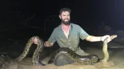 Forrest Galante Sitting In The Mud With The Anaconda