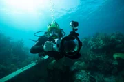 Josh takes photos for photogrammetry in order to create a 3D reconstruction of the shipwreck.