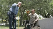 Josh and Coy Lothrop dig for treasure at White Point Gardens in Charleston, South Carolina.