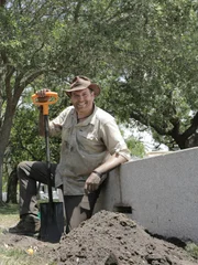 Josh and Coy Lothrop dig for treasure at White Point Gardens in Charleston, South Carolina.