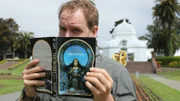 Josh Gates reads “The Secret” in the hopes of finding treasure.