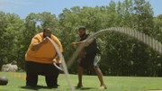 Drew with his trainer at the park.