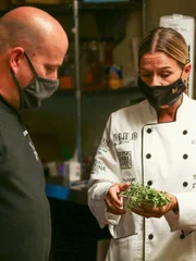 Cat Cora in Kitchen 3 (L-R: Tony Ferraro, Cat Cora)