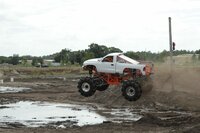 Mud Stick makes the first jump of the course. Mud Stick makes the first jump of the course.
