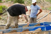 Nathan Clark & Chris Taylor work on the sluice box