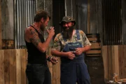 Josh and Daniel tasting Moonshine