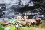 Anna and Jered under the waterfall.