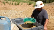 Dave Turin panning for gold