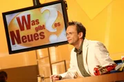 "Was gibt es Neues?" Im Bild: Oliver Baier. Die kuriosesten Fragen, die witzigsten Antworten, die verrücktesten "Dinge der Woche" und viel Spaß mit Oliver Baier und seinen Gästen.