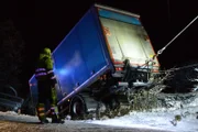 Odda, Norway - Truck from behind. Attached to wires to get help up from the ditch.