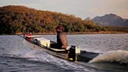 Chris travels alone in boat.