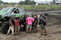 Mudders of Mayhem’s Dancin’ Bones catches big air on the muddy track. Mudders of Mayhem’s Dancin’ Bones catches big air on the muddy track.