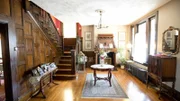 The original front room and staircase in the vintage victorian home that Steve is renovating with his sister Leanne as seen on Restored by the Fords                                                                   Front Room before 1