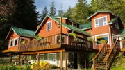 Back of main house on purchased property, bart island home, in Sitka, Alaska, as seen on Living Alaska.