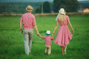 photo of happy family in country style