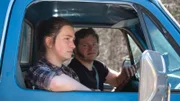 Gabe and Bird Brown in the cab of the farm truck.