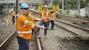 Sydney train station employees during work.
