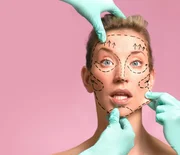 Plastic surgeon marking up for surgery