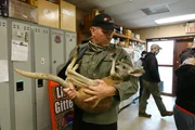Michael Beran holding adopted kangaroo at Wildlife Comman Center.