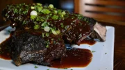 Plate of ribs from Cookin' with Lenny Smokehouse, as seen on Food Network's Mystery Diners, Season 8.