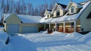 The southern stylings of the Knik Arm house pays tribute to front porch living even as far north as Alaska. 20 miles northeast of Anchorage, this home offers over 5000 sq ft on 2.5 acres of land, as seen on Living Alaska.