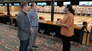 Host Charles Stiles and Eliot talk to the owner in front of the bowling lanes at Corbin Bowling Center in Tarzana, California, as seen on Food Network's Mystery Diners, Season 9.